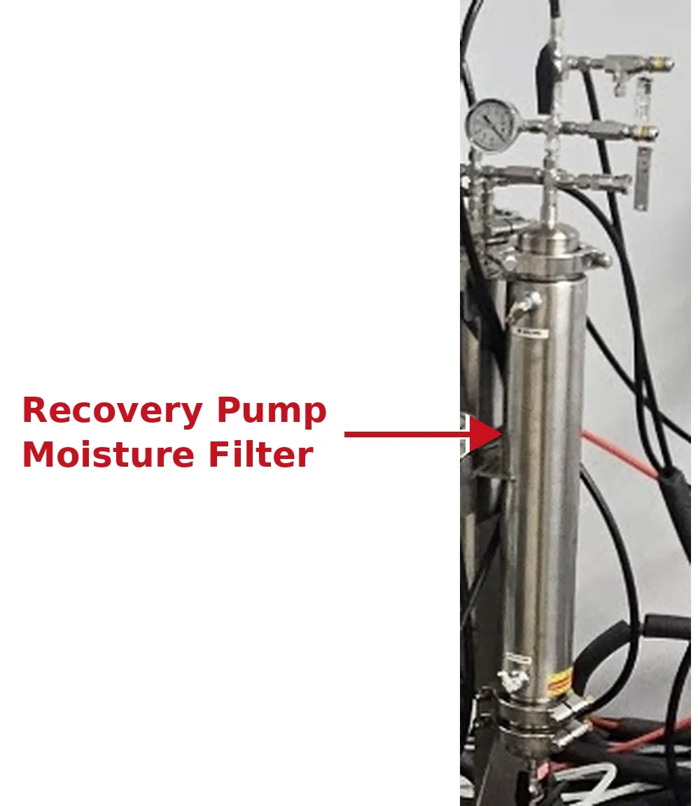 Recovery Pump Moisture Filter: a narrow stainless steel vessel with a pressure gauge and fittings at the top